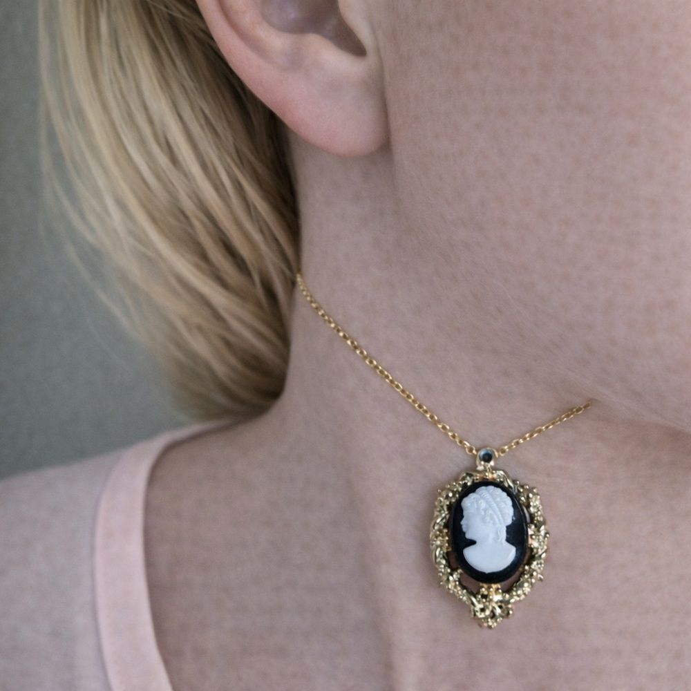 Elegant Gold and Black Cameo Pendant